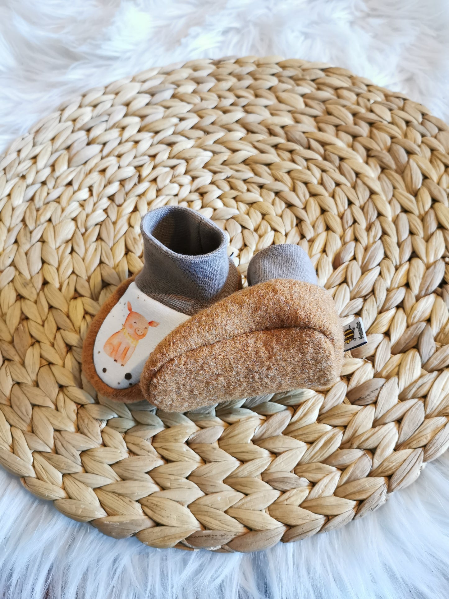 Walkpuschen Schweinchen ocker Gr. 16 (0-3 Monate)